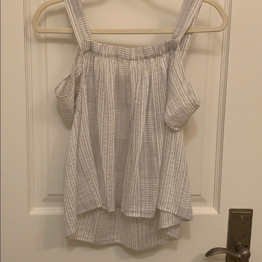 Lou and grey shirt